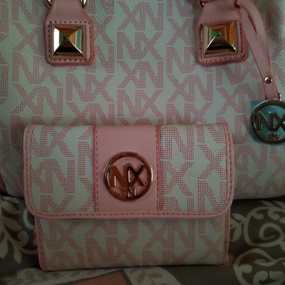 NX bag with matching wallet. Soft pink color.